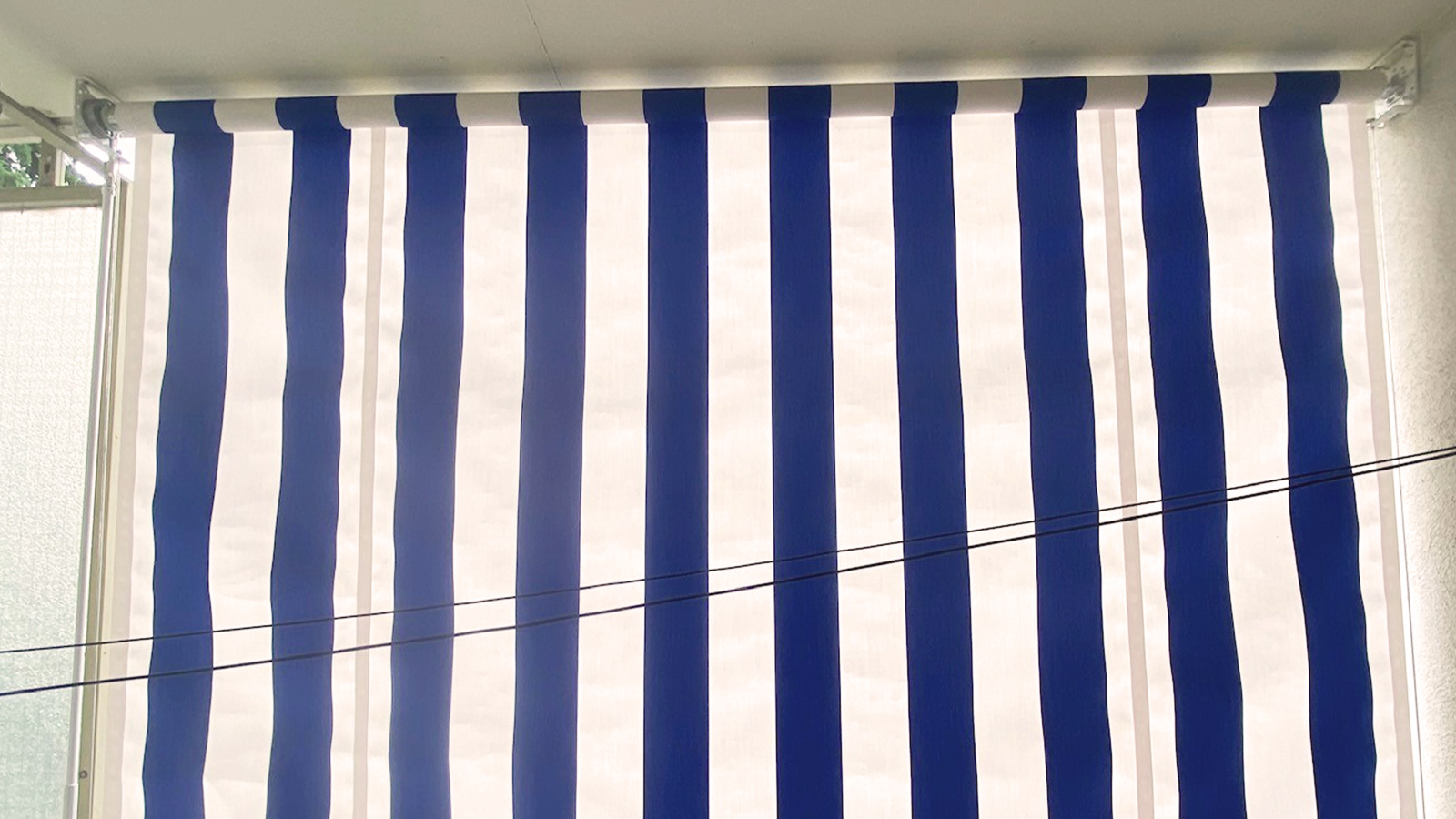store toile vertical à conducteur